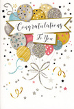 A tall, elegant congratulations card stands as though just set alongside a vase of celebratory blooms in a Parsons Green home, its front alive with a sense of airy joy. The main focus is a cheerful bouquet of illustrated balloons, clustered together and floating upwards with a gentle, almost weightless lift. Their colours are soft and sophisticated: brushed gold, cool silver, delicate champagne, sky-tinted blue, blush pink, and calm grey. Each balloon has its own personality, decorated with tiny twinkling stars, neat stripes, or a dusting of glitter that suggests texture you could almost feel with your fingertips. Slender ribbons in metallic gold and silver trail downwards from the base of the balloon cluster, curling and crossing like the trailing ends of a hand-tied bow. Around them, the pale background is dotted with scattered stars, tiny specks of confetti, and playful swirls that give the impression of movement, as if a breeze from Parsons Green Common has just swept through the room. Across the centre of the design, a floating banner bears a graceful "Congratulations To You" message in flowing script, its warmth and sincerity shining through the stylised letters. The entire card feels like a quiet burst of happiness, ideal for partnering with a fresh flower arrangement for same-day delivery around Parsons Green, Fulham, and the nearby streets. It's the sort of design that speaks clearly of pride, joy, and encouragement, celebrating life's big achievements-from graduations to new homes-without ever losing its gentle, thoughtful charm.