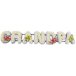 This image features a long, horizontal floral tribute that spells out "GRANDPA" in large capital letters, arranged in a clear, uncluttered studio setting with a plain white backdrop. Every letter is completely covered with fresh white chrysanthemums, their compact, rounded petals layered tightly to create a thick, cushion-like effect that feels soft, comforting, and full of quiet symbolism. At the base of each letter, a narrow band of pale lavender ribbon runs like a delicate border, giving the shapes crisp definition and adding a refined hint of cool colour that contrasts gently with the pure white flowers. All seven letters are mounted on a single dark green support bar that is largely concealed beneath the blooms but holds the tribute together as one continuous piece. Carefully placed floral sprays break the white surface to add character and meaning. On the "G" and "D," glossy red anthuriums stand proudly, their heart-shaped, waxy petals and upright yellow spadices framed by rich green leaves and flecks of tiny purple blossoms, evoking strong, heartfelt love. The first "A" and the final "A" are softened with clusters of yellow-green orchids, likely cymbidiums, whose open faces and speckled throats introduce a graceful, modern touch, nestled within smooth green foliage that arches gently over the chrysanthemum base. The overall impression is one of tenderness and respect, a bespoke "Grandpa" funeral tribute such as a family in Parsons Green might arrange for a church service or crematorium ceremony, ensuring their grandfather is honoured with a beautifully considered display that feels both traditional and deeply personal.